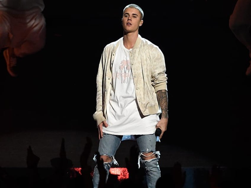 measles scare in japan after infected man attends justin bieber concert