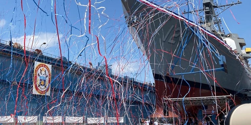 medal of honor recipient christens future us navy destroyer that will bear his name