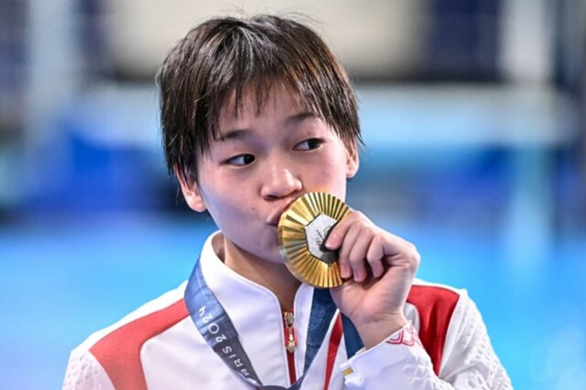 Olympic diving gold medallist Quan Hongchan has been the focus of intense interest from ob