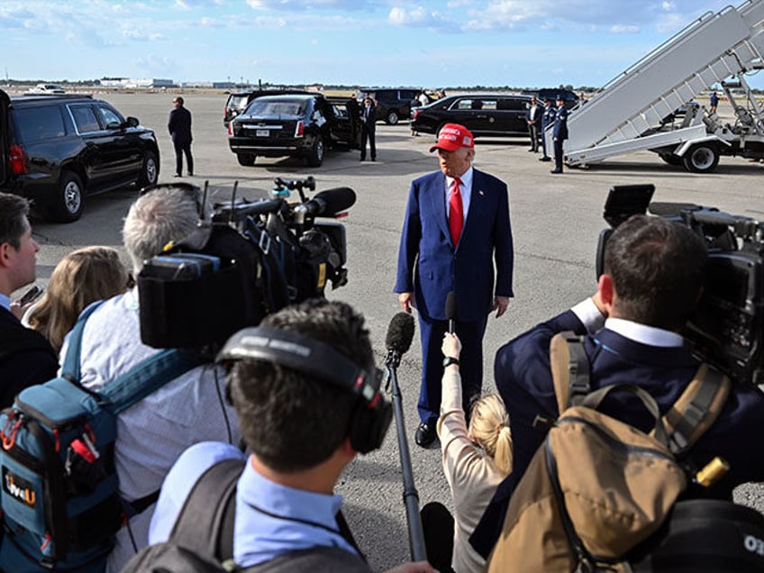 President Donald Trump speaks to reporters after landing at Palm Beach International Airpo