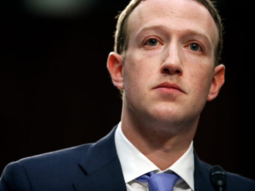 FILE- In this April 10, 2018, file photo, Facebook CEO Mark Zuckerberg testifies before a
