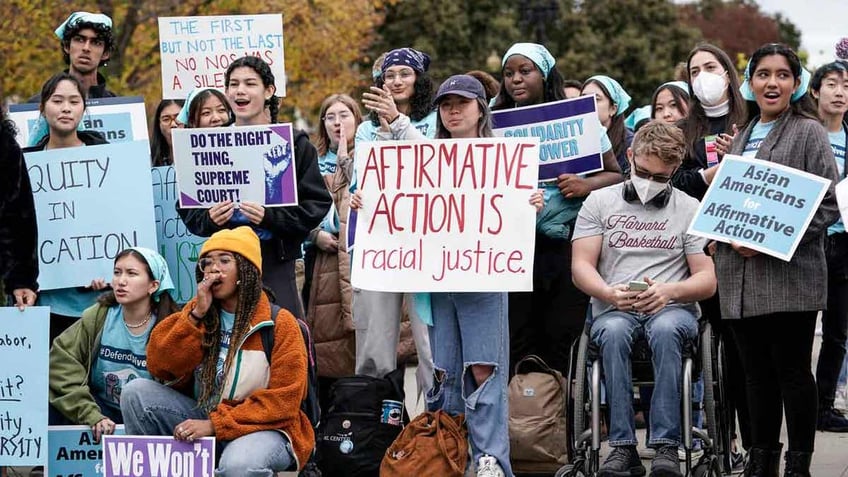 Activists demonstrate as the Supreme Court hears oral arguments on a pair of affirmative action cases, Washington, D.C., Oct. 31, 2022.