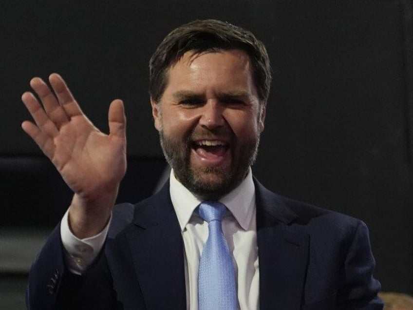 Republican vice presidential candidate Sen. JD Vance, R-Ohio, waves as he attends the firs