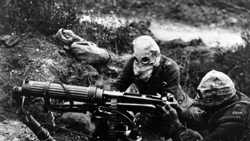 Soldiers wearing gas masks