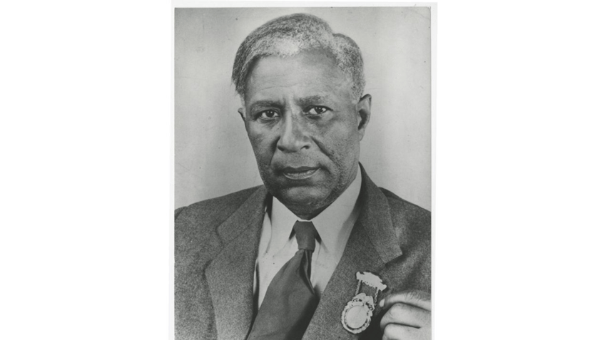 Garrett A. Morgan displaying lapel pin