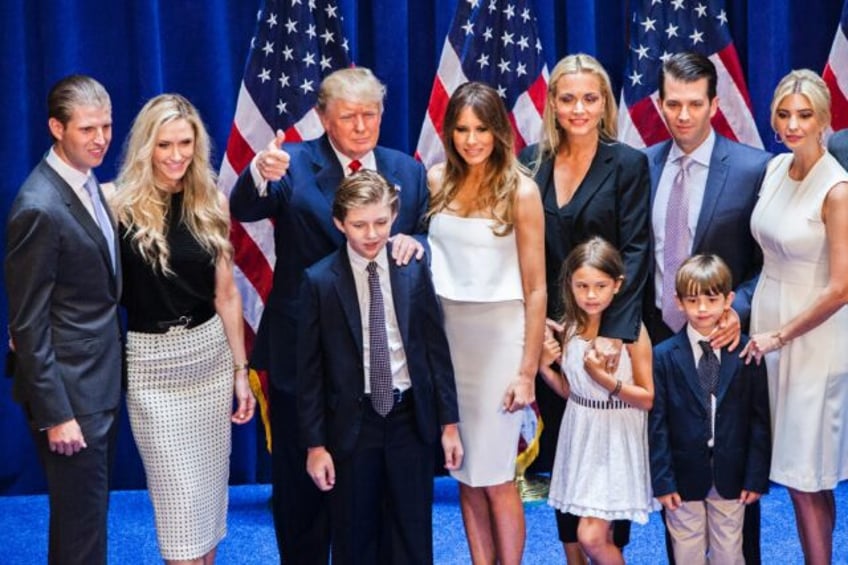 Donald Trump's family -- including (L-R) Eric Trump, Lara Trump, Donald Trump, Barron Trum