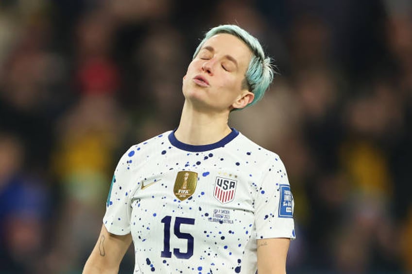 Megan Rapinoe of USA reacts after missing her team's fourth penalty in the penalty shoot out during the FIFA Women's World Cup Australia & New...