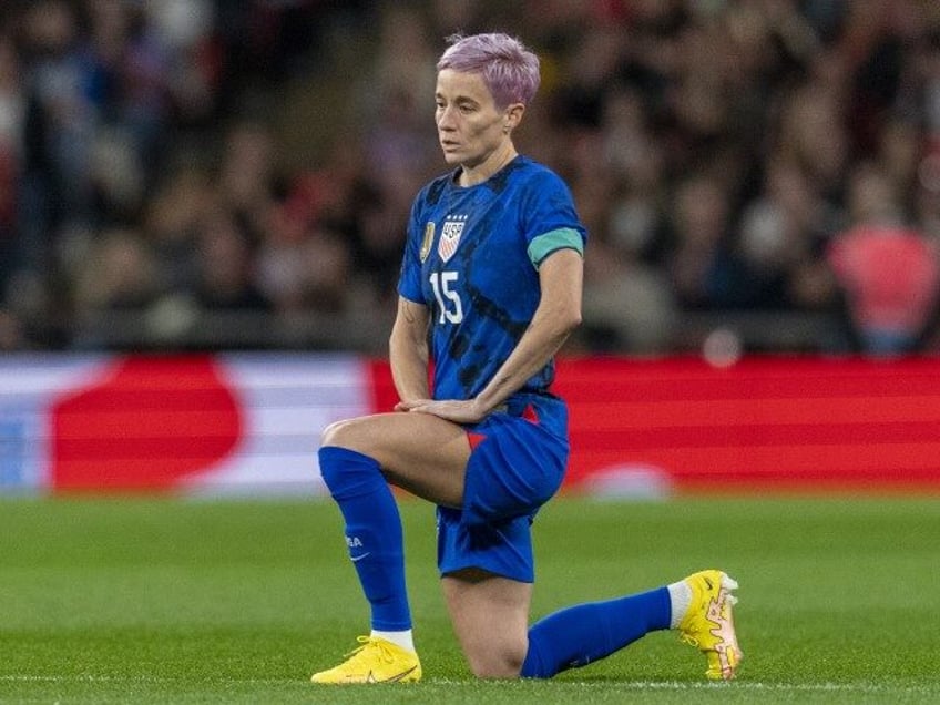 Megan Rapinoe #15 of the United States kneels during a game between England and USWNT at Wembley Stadium on October 7, 2022, in London, England. (Brad Smith/ISI Photos/Getty Images)