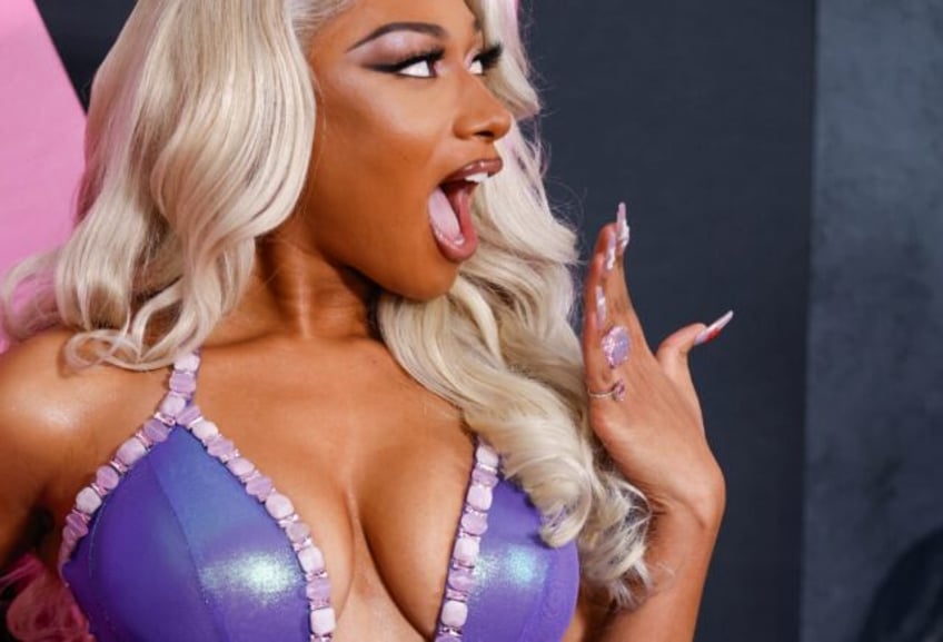 US rapper Megan Thee Stallion is being sued by a cameraman who claims he was forced to wat