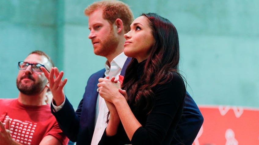 Britain's Prince Harry and his fiancee Meghan Markle visit the Terrence Higgins Trust World AIDS Day charity fair at Nottingham Contemporary in Nottingham, Britain, December 1, 2017. REUTERS/Adrian Dennis/Pool - RC1473D09210