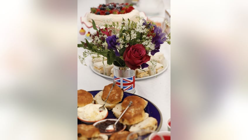 A plate of jam and biscuits