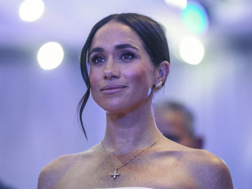Britain's Meghan, Duchess of Sussex, looks on as she attends a Sit Out with Britain&#