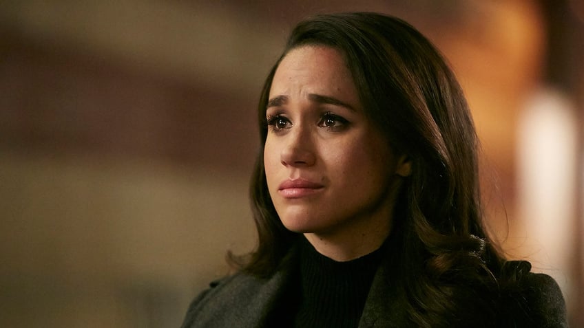 Close-up of Meghan Markle crying as Rachel Zane