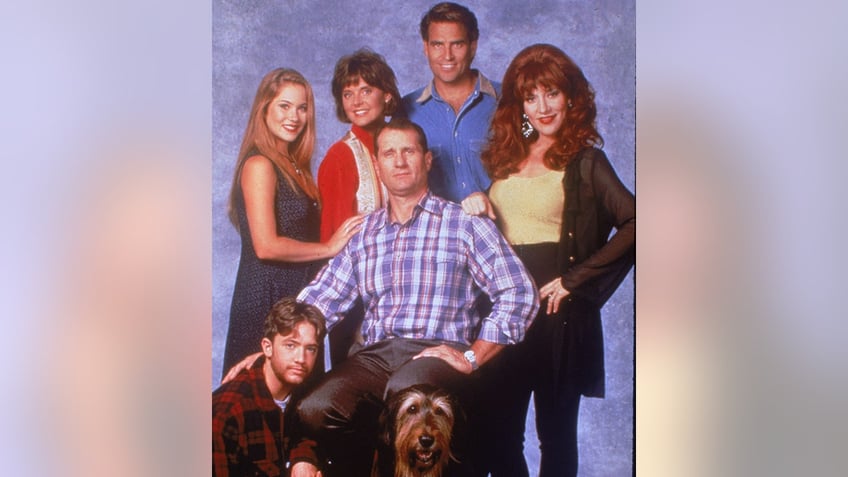 "Married...With Children" picture of cast starring Ed O'Neill in center