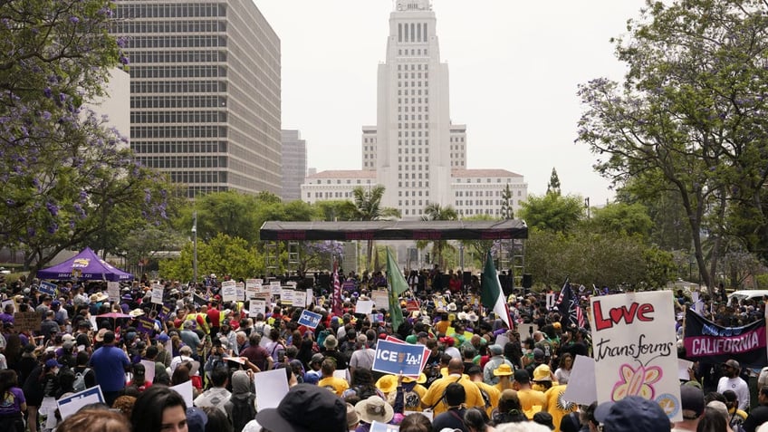 People attend a rally