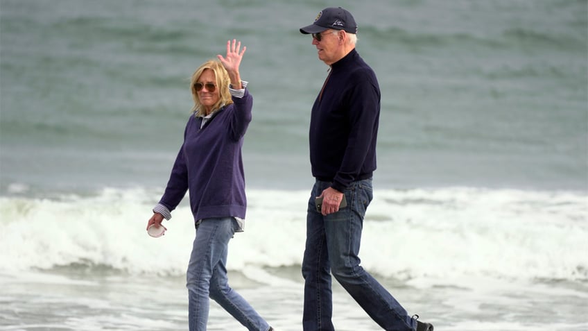 Jill and Joe Biden walking on beach