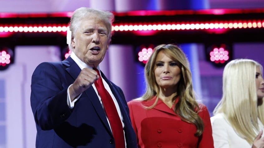 Republican presidential candidate, former U.S. President Donald Trump and Former first lady Melania Trump on stage