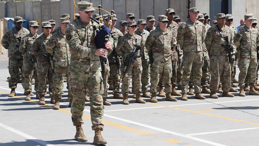 memorial day ceremony held in baghdad to honor us army soldiers killed in iranian backed drone attack