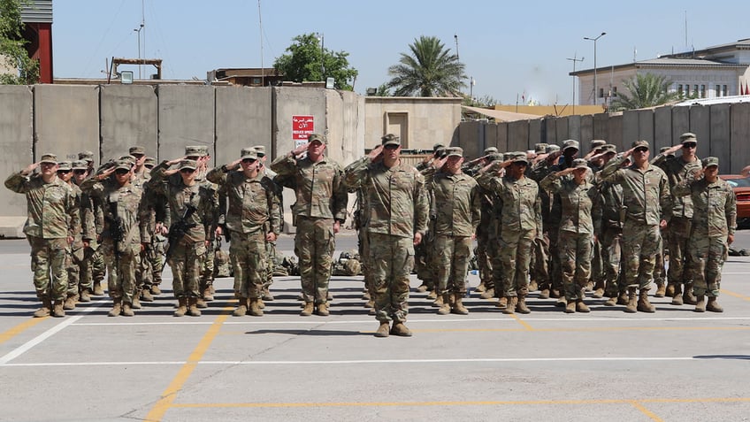 memorial day ceremony held in baghdad to honor us army soldiers killed in iranian backed drone attack