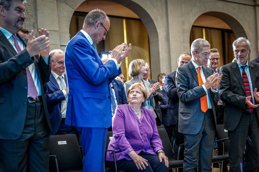 merkel comes out of retirement to express anger at german parliament voting for border control