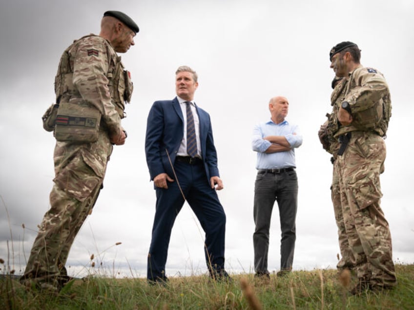 Labour leader Sir Keir Starmer and shadow defence secretary, John Healey (centre right) me