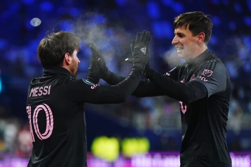 Lionel Messi (left) celebrates with Inter Miami teammate Tadeo Allende after scoring the w