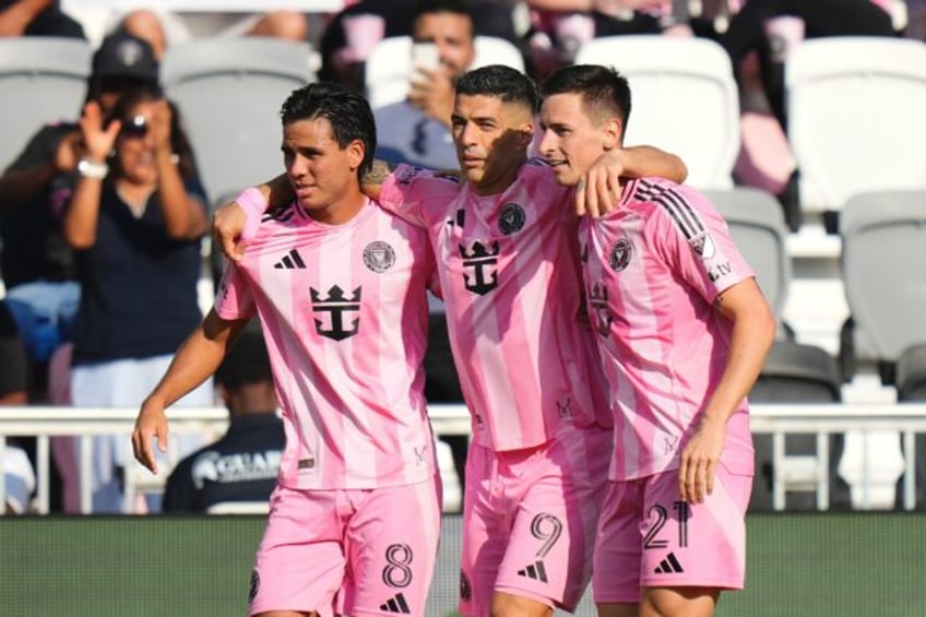 Tadeo Allende #21 of Inter Miami celebrates with teammates Luis Suárez #9 and Telasco Seg