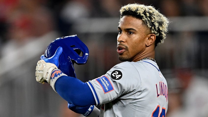 Francisco Lindor looks on field