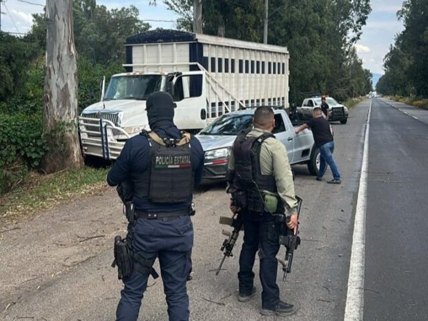 Police officers in Michoacan check a vehicle. (Credit: Michoacan Public Security Secretari