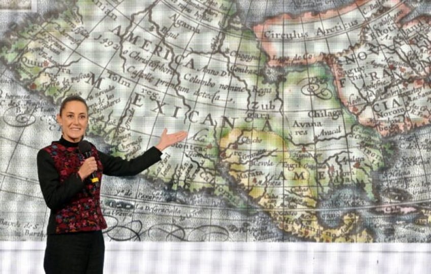 Mexico's President Claudia Sheinbaum displays a 17th-century world map showing "America Me