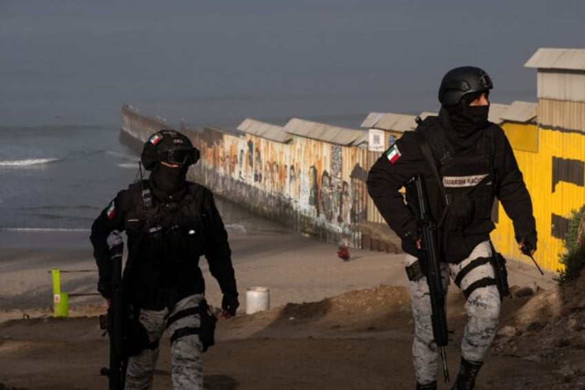 Members of Mexico's National Guard patrol near the border with the United States in Tijuan