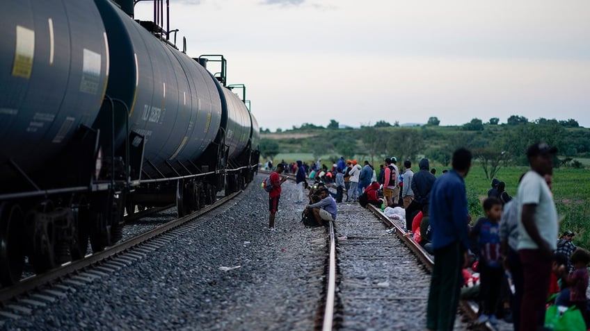 mexico railway halts train operations after viral video showing migrants riding to the us