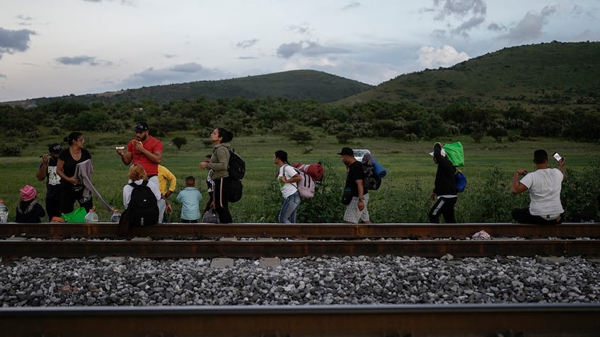 mexico railway halts train operations after viral video showing migrants riding to the us