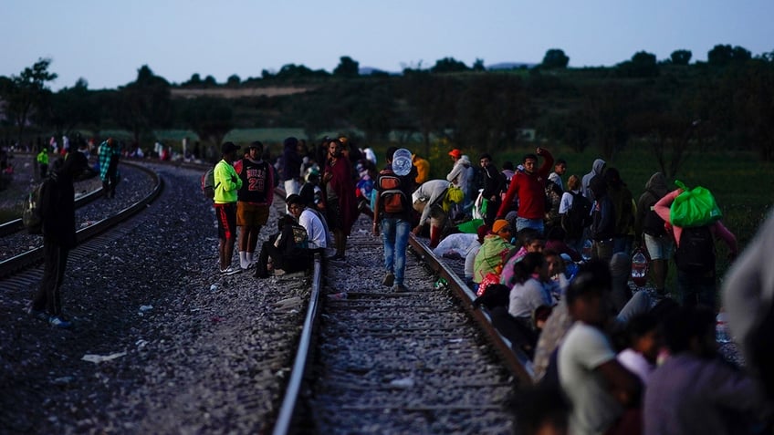 mexico railway halts train operations after viral video showing migrants riding to the us