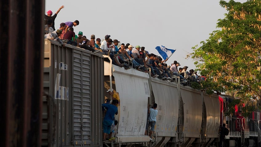 mexico railway halts train operations after viral video showing migrants riding to the us