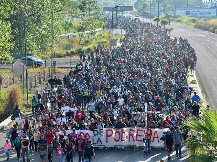 Migrants depart from Tapachula, Mexico, Sunday, Dec. 24, 2023. The caravan started the trek north through Mexico just days before U.S. Secretary of State Antony Blinken arrives in Mexico City to discuss new agreements to control the surge of migrants seeking entry into the United States. (AP Photo/Edgar H. Clemente)