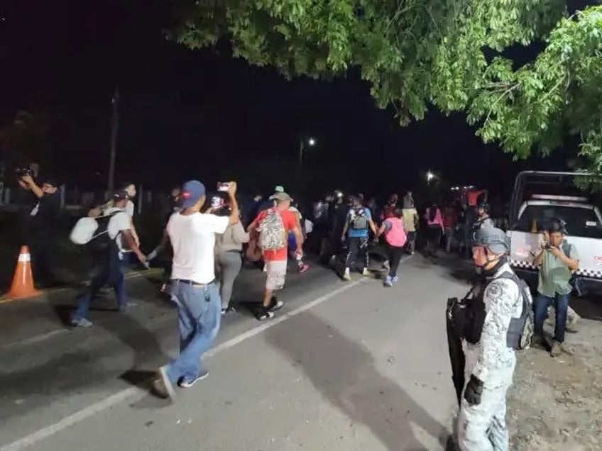 mexicos national guard escorting new migrant caravan headed to us border