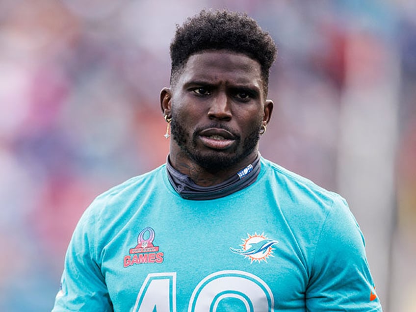 Tyreek Hill #10 of the Miami Dolphins and AFC looks on during the 2024 NFL Pro Bowl at Cam