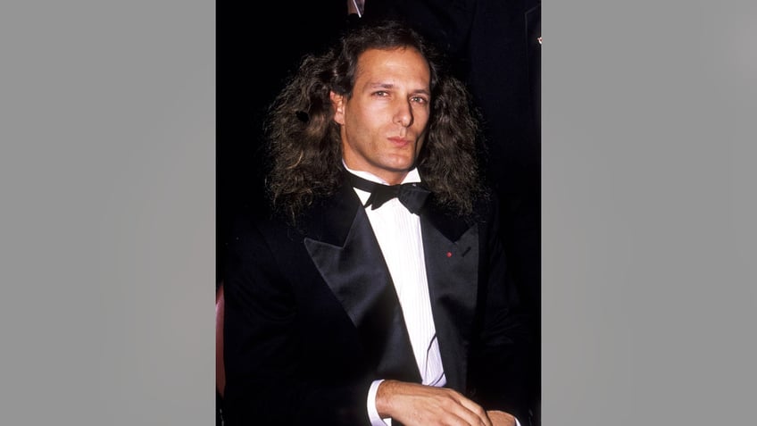 Michael Bolton wearing a tux.