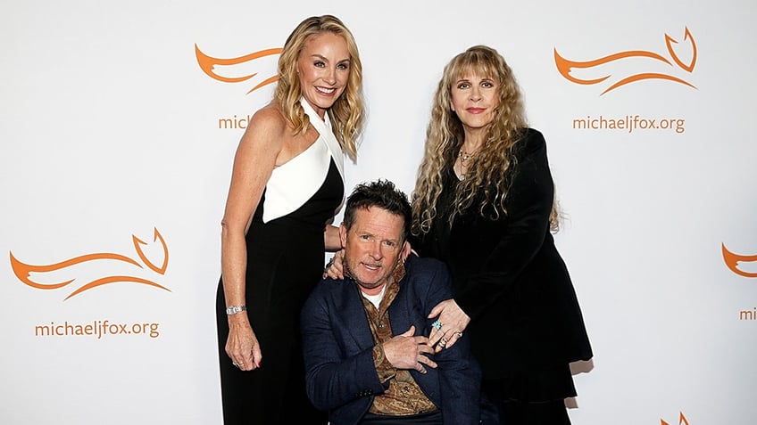 Tracy Pollan, Michael J. Fox and Stevie Nicks attend A Funny Thing Happened On the Way to Cure Parkinson's red carpet