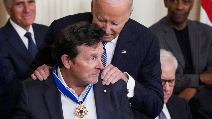 president biden presents Michael j fox with presidential medal of freedom