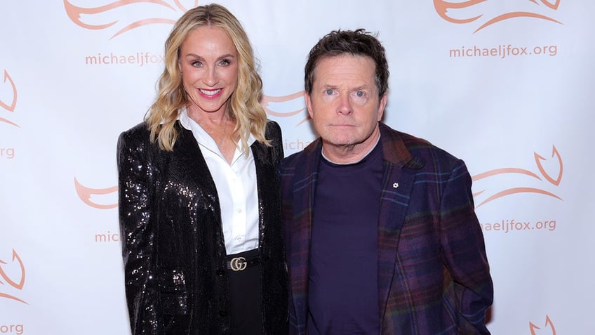 michael j fox reunites with back to the future co star christopher lloyd at charity event