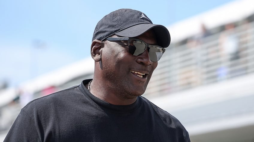 Michael Jordan, NBA Hall of Famer and co-owner of 23XI Racing, walks the grid prior to the NASCAR Cup Series Straight Talk Wireless 400 at Homestead-Miami Speedway on Oct. 27, 2024 in Homestead, Florida.