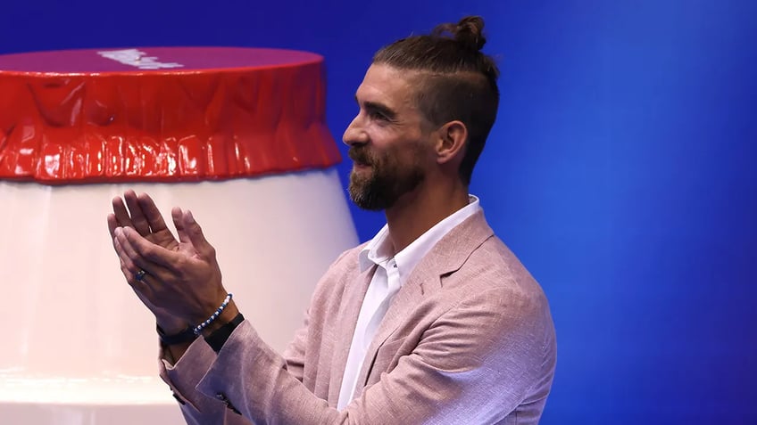 michael phelps watches final individual swimming record shattered by french phenom that was insane