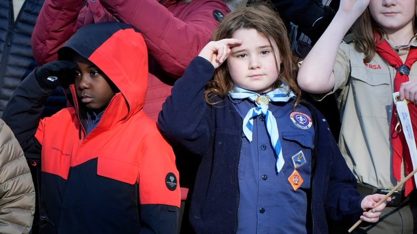 children salute Carter casket at mourning event in Atlanta