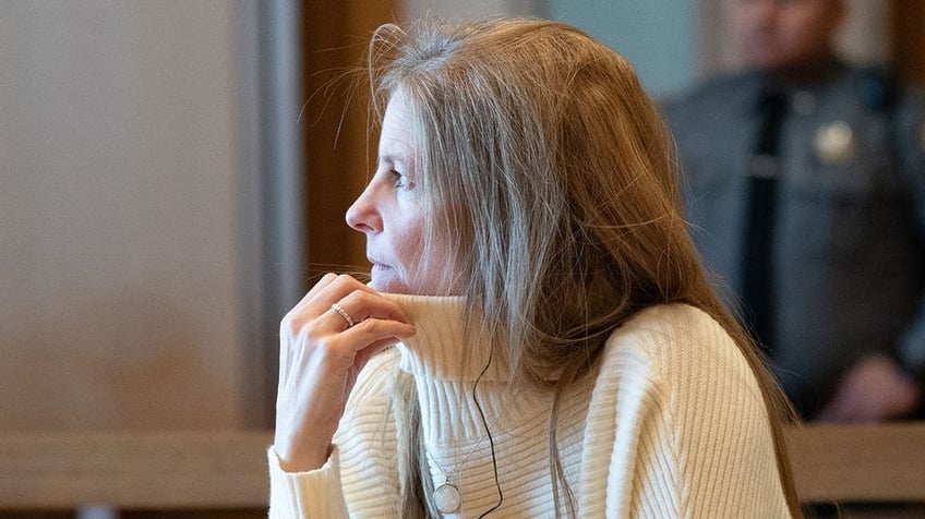 Michelle Troconis listens to testimony during the second day of her trial