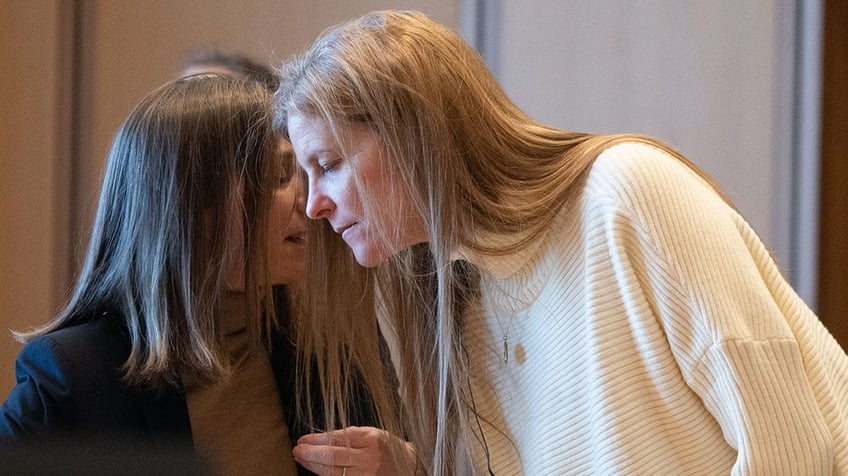 Michelle Troconis listens to testimony during the second day of her trial