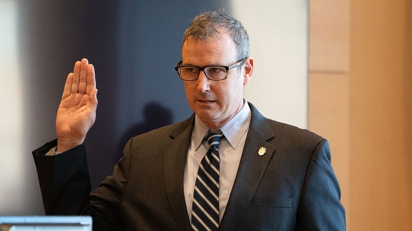 Former Connecticut State Police Detective Reilly is sworn in during the second day of Michelle Troconis’ trial