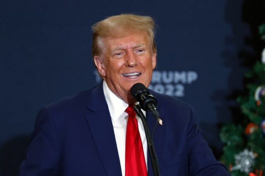 Former US President and 2024 presidential hopeful Donald Trump speaks during a campaign event in Waterloo, Iowa, on December 19, 2023