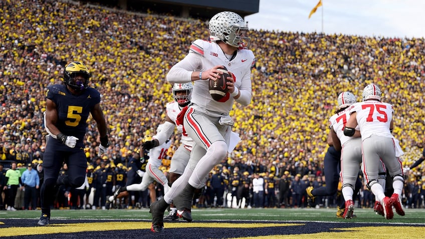 michigan defeats ohio state for third straight year after last minute interception